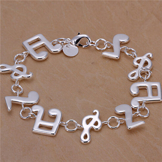 Musical ornaments bracelet 925 silver (plated) quality links & lobster claw lock