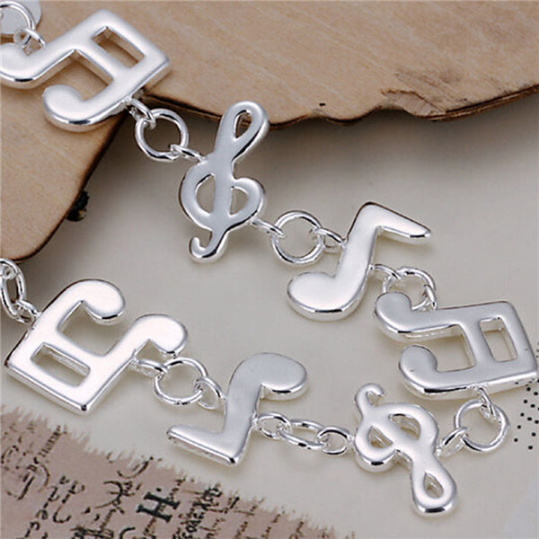 Musical ornaments bracelet 925 silver (plated) quality links & lobster claw lock