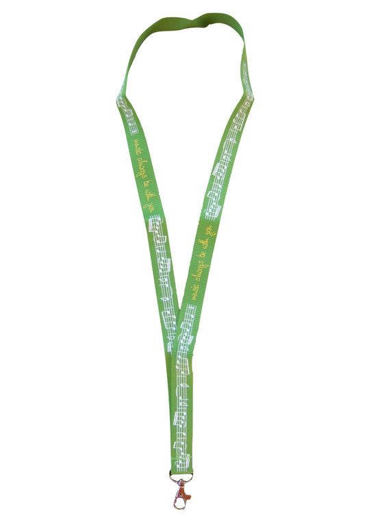 Green neck lanyard with music notes design and metal clip