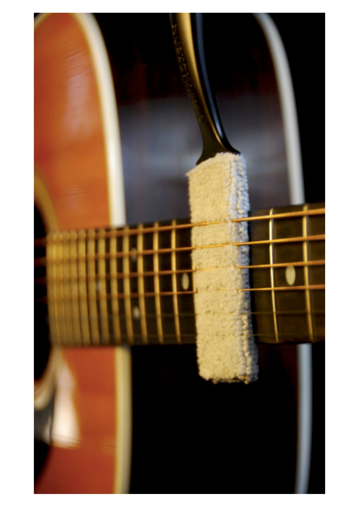 The Nomad Tool all-in-one string instrument & hardware cleaning brush