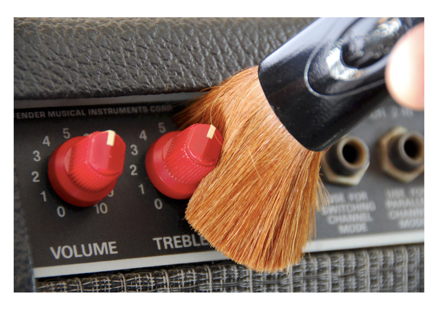 The Nomad Tool all-in-one string instrument & hardware cleaning brush
