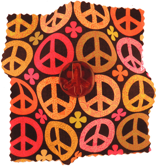 Peace shaped Rockin Rosin for violin viola or cello, patterned cloth