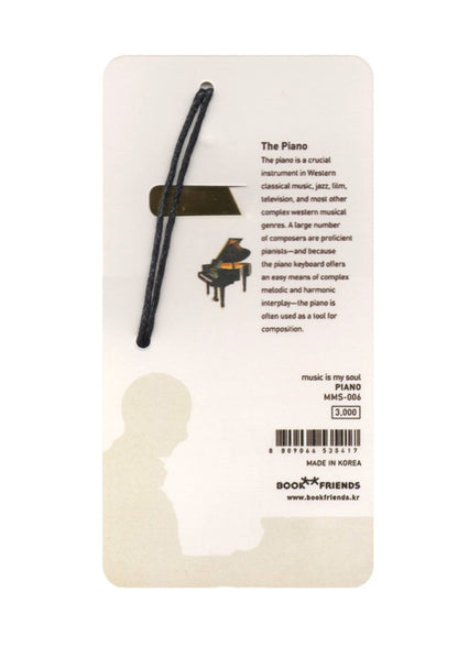 Polished gold metal piano bookmark with black tassel cord